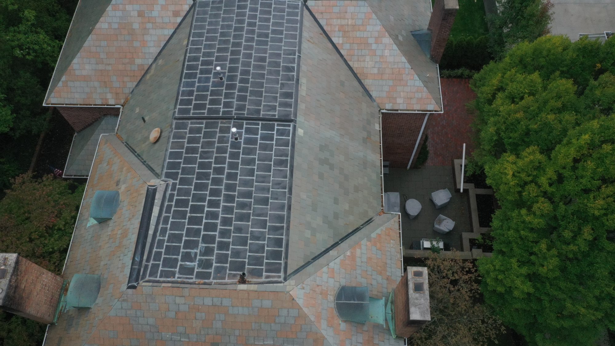 Aerial view of restored slate roof in Bexley Ohio