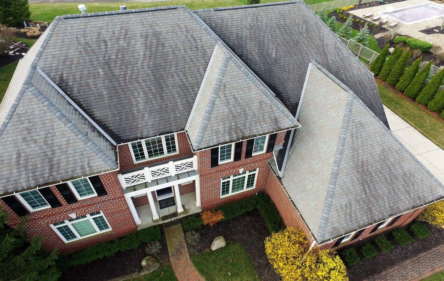 Columbus Ohio roof covered in black algae streaks before cleaning