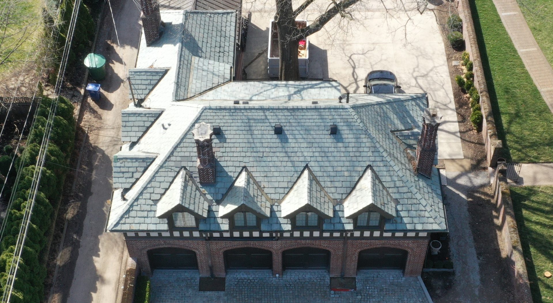 Carriage house slate roof in Bexley after professional cleaning showing clean uniform slate