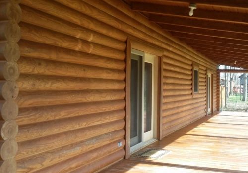 Wood siding restored to natural color after Forza treatment