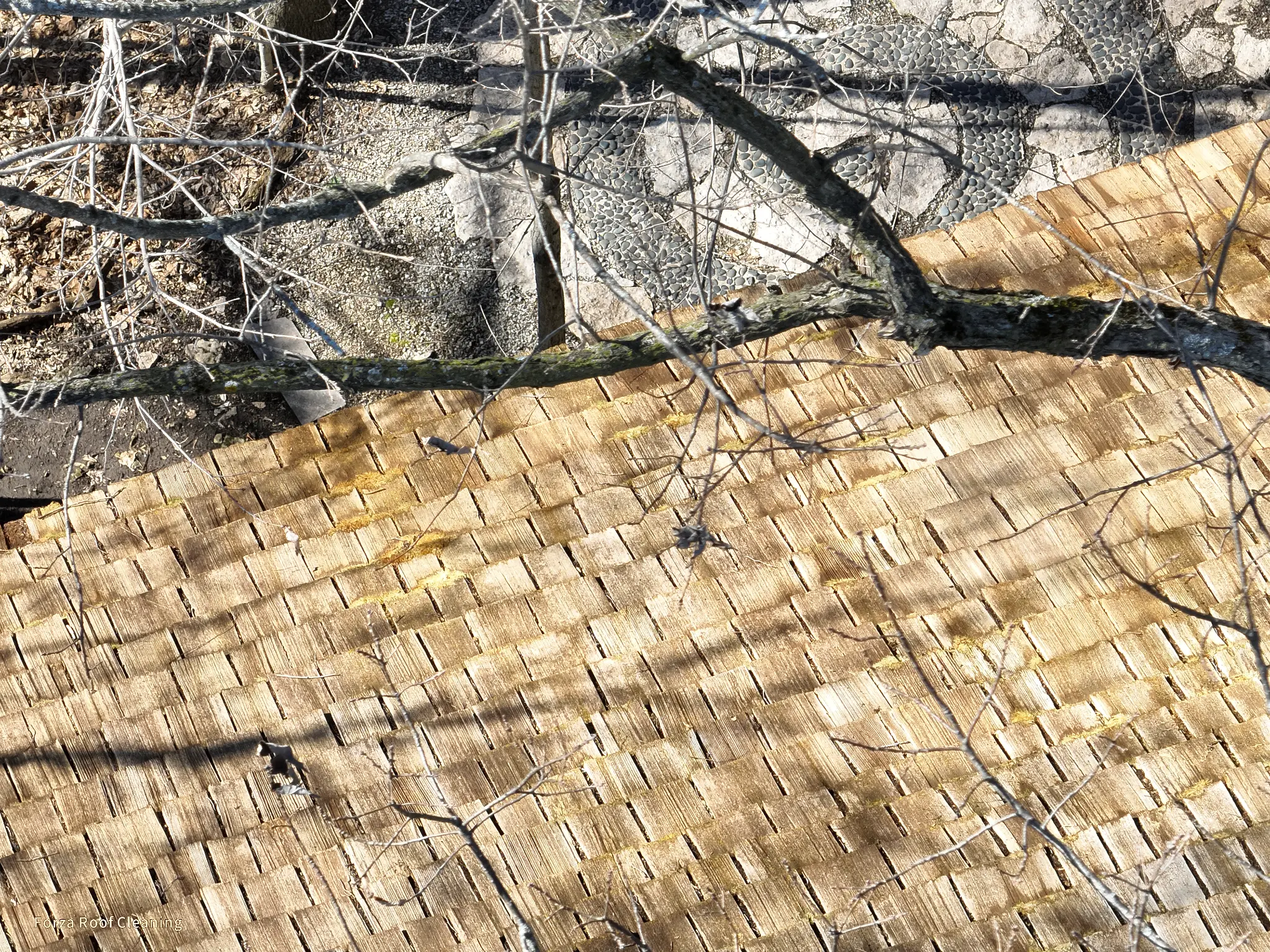 After cedar roof cleaning - ridge line and shakes completely clean with natural wood grain visible, Muirfield Village Dublin Ohio