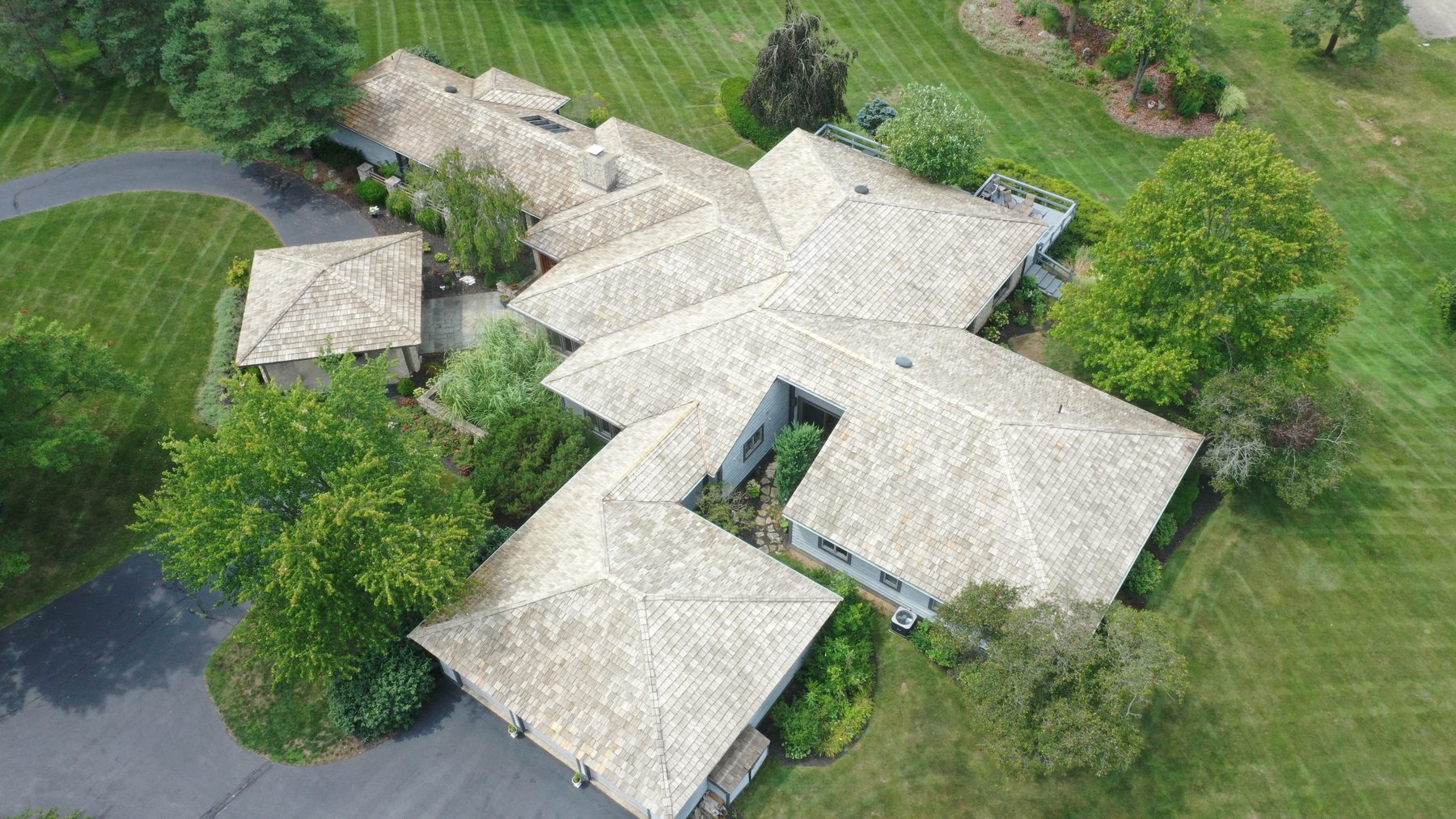 Cedar shake roof after cleaning - fairway-adjacent home Muirfield Village Dublin Ohio