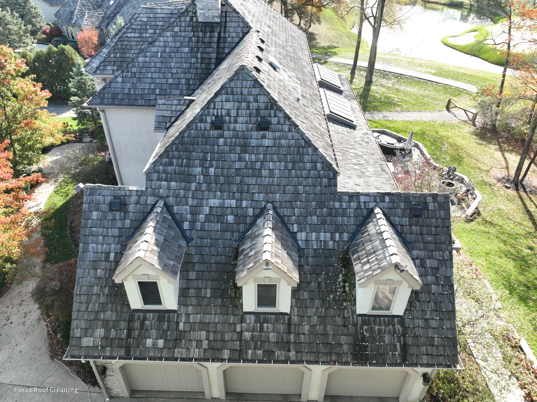 Cedar shake roof before cleaning - course-backing home Muirfield Village Dublin Ohio