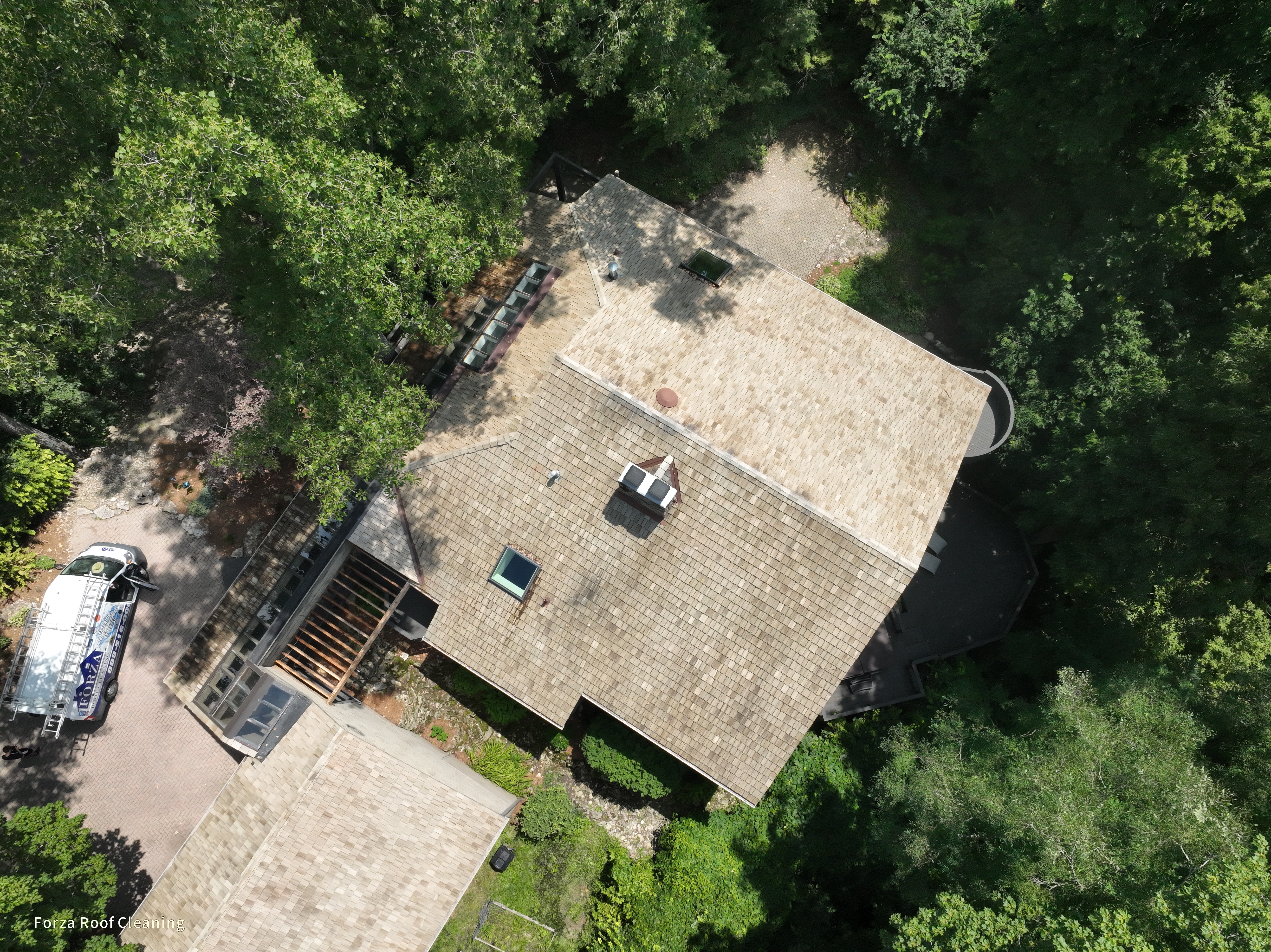 Cedar shake roof cleaning results - quarry-side home in The Quarry Dublin