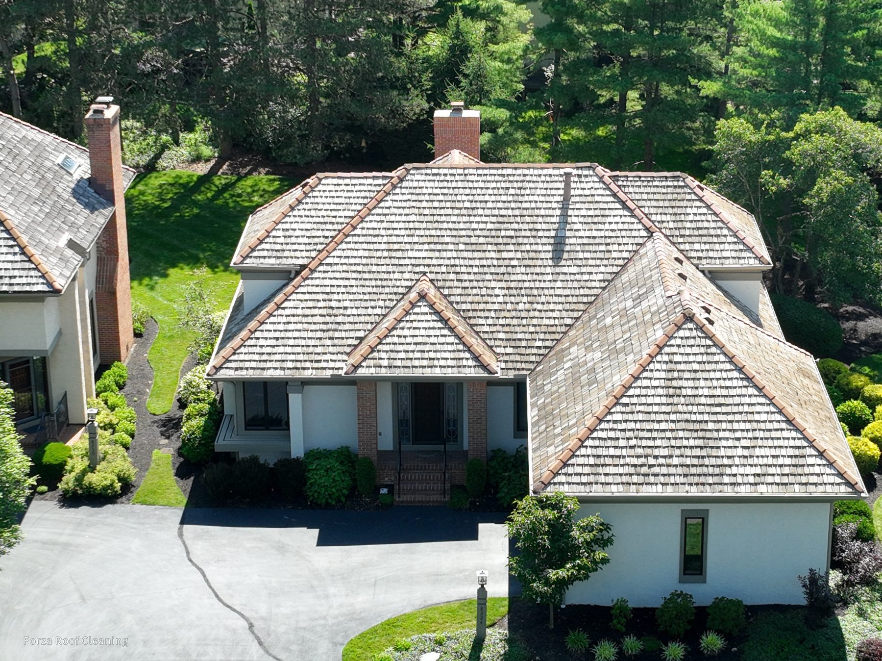 Cedar shake roof cleaning results - ravine-backed home in The Sanctuary Columbus