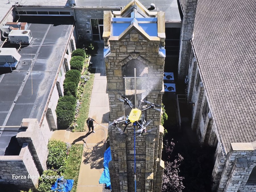 Forza drone washing a church bell tower in Columbus Ohio