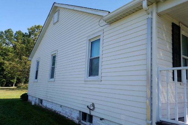 House siding restored to clean bright finish after Forza treatment