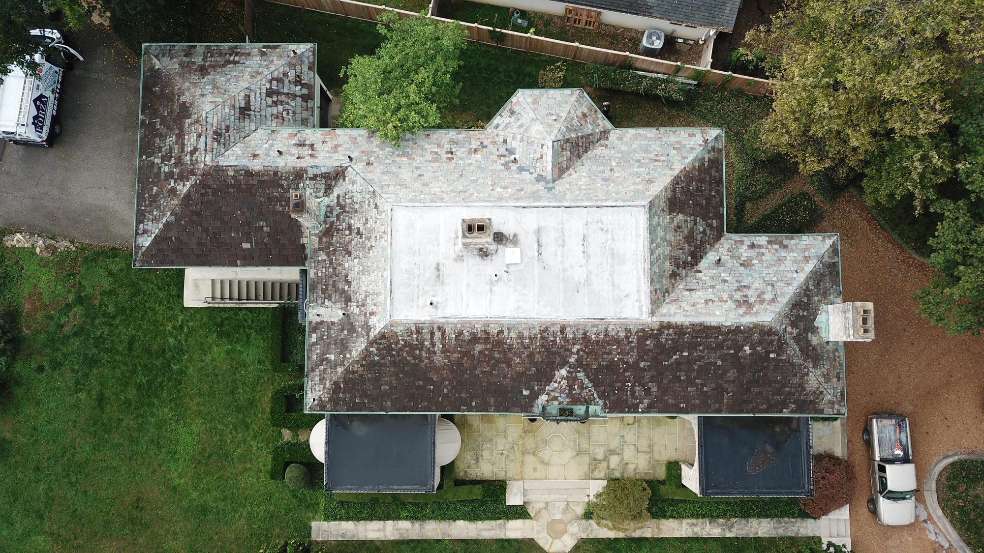 Slate roof in Bexley before cleaning showing dark algae coverage