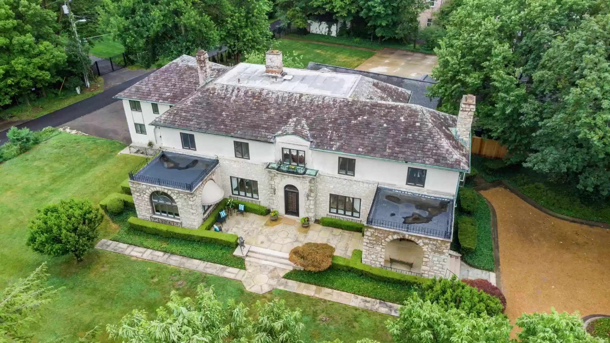 Overview of Bexley slate roof with algae staining before cleaning