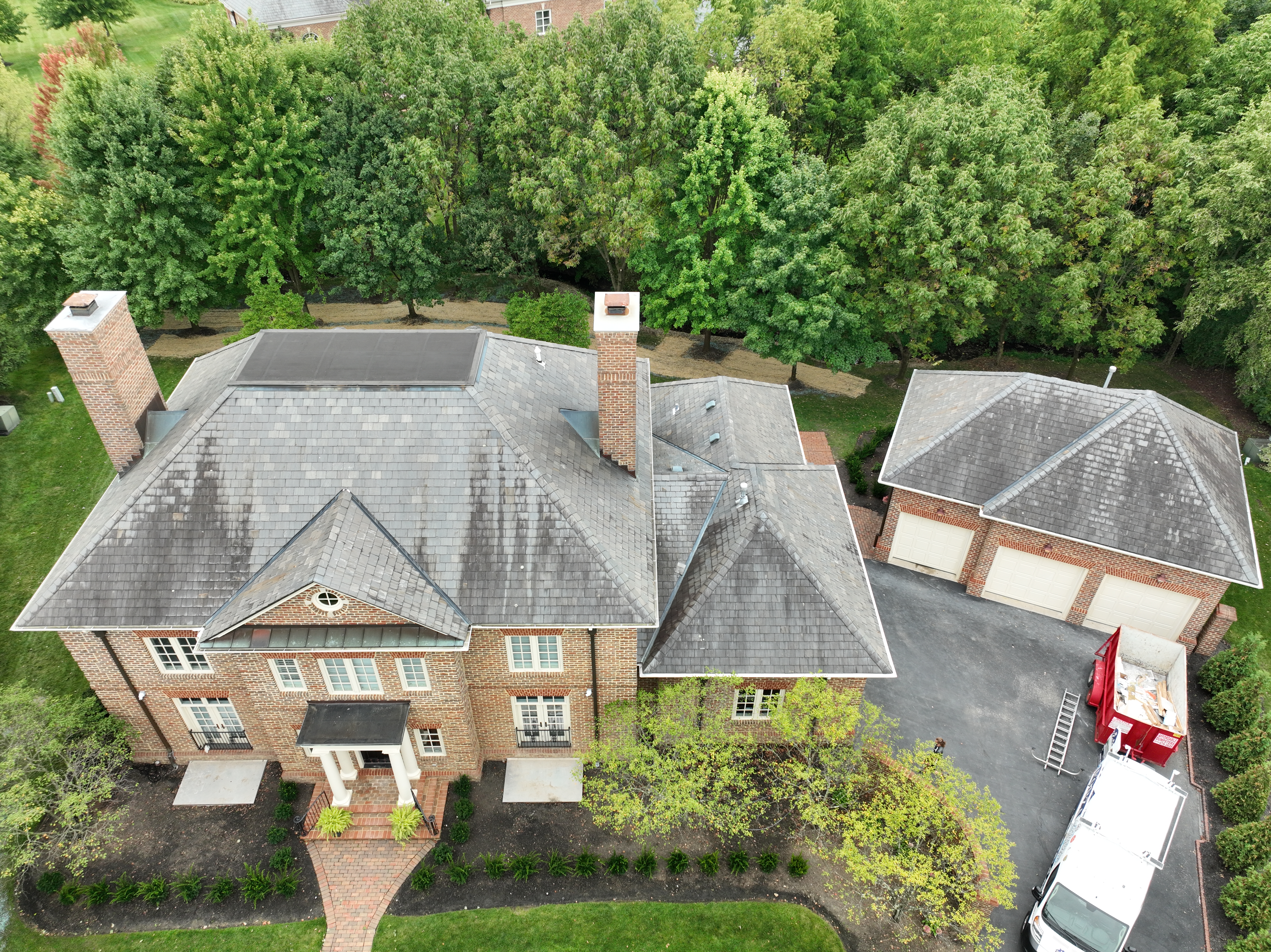 Before slate drone washing - aerial view of slate roof with dark algae staining in New Albany Ohio