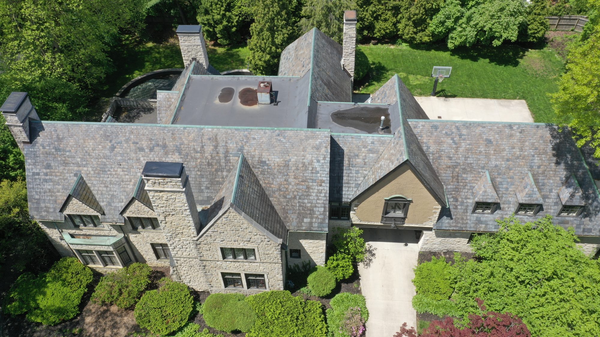 Slate roof in Bexley before cleaning showing dark algae coverage
